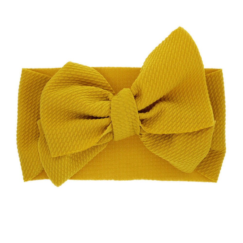 New-born baby's solid-colored bow headband